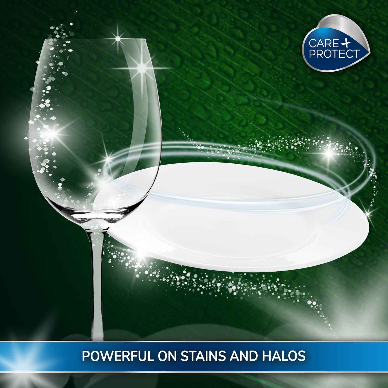 A clear wine glass and white plate sparkle with magic-like effects, emphasising cleanliness. The background is textured green. Text reads "POWERFUL ON STAINS AND HALOS" and "CARE+PROTECT."