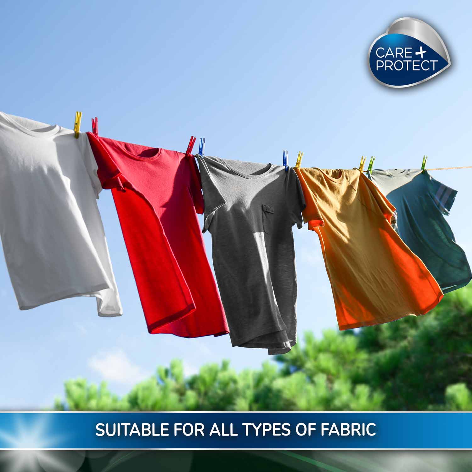 Shirts of various colours hang on a clothesline with clothespins under a clear sky. Text reads: "SUITABLE FOR ALL TYPES OF FABRIC." A “CARE+PROTECT” logo is present.