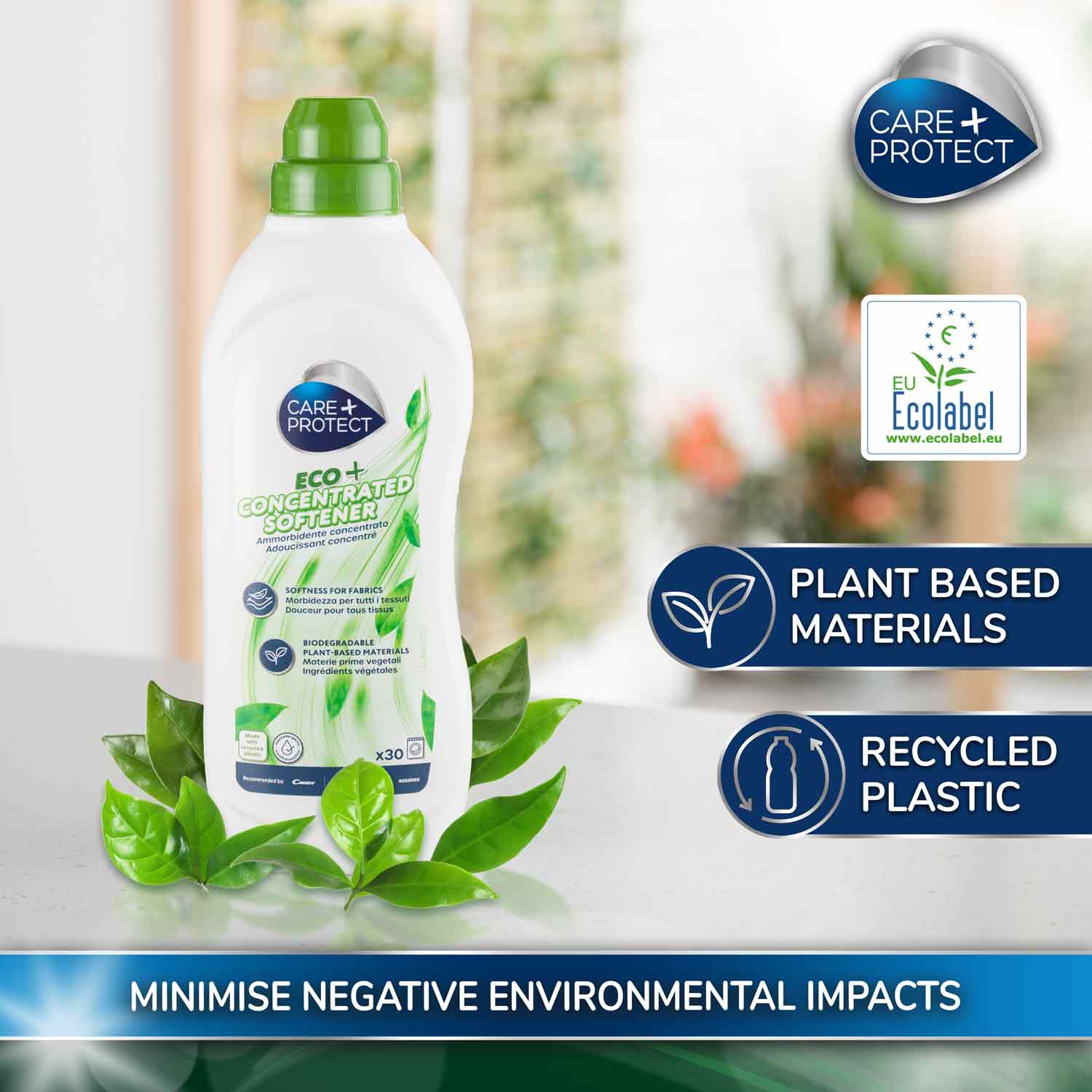Bottle of Care+ Protect Eco+ Concentrated Softener stands on a surface with green leaves, featuring text: “SOFTNESS FOR FABRIC,” “BIODEGRADABLE PLANT-BASED MATERIALS,” “PLANT BASED MATERIALS,” “RECYCLED PLASTIC,” and “MINIMISE NEGATIVE ENVIRONMENTAL IMPACTS.”